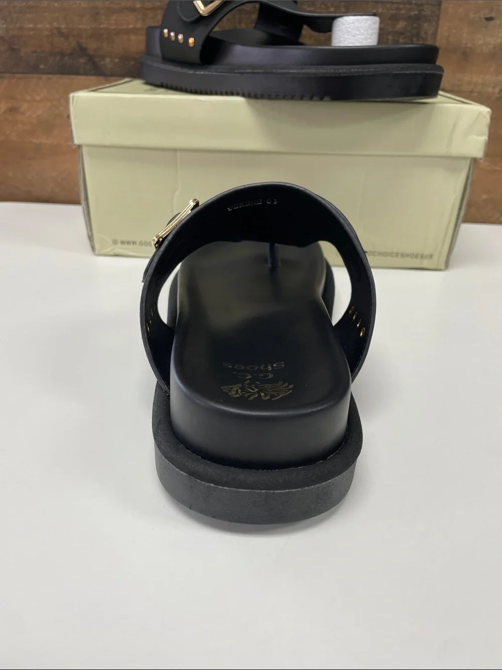 Women’s Black Thong Sandals with Gold Buckle Accent
